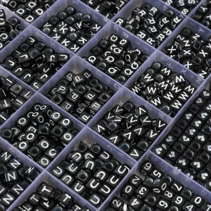DIY black square alphabet beads set with white A-Z letters and heart icons in 28 grid box