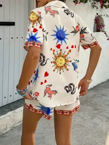 Back view of women's two-piece set featuring colorful floral prints and short sleeves