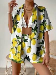 Detail of summer three-piece set featuring fresh lemon print shirt and matching shorts