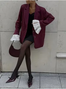 Chic burgundy striped blazer with ruffled cuffs and matching handbag for women