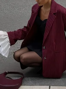 Chic burgundy striped blazer for women featuring oversized white ruffled patchwork sleeves