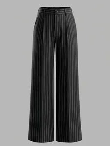 Detail of high waist vertical pinstripe wide leg trousers with button closure