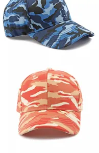 Detailed view of camouflage baseball caps in blue and orange patterns with canvas texture