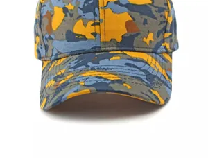 Detailed macro view of camo baseball cap showing multi-color camouflage pattern and stitching