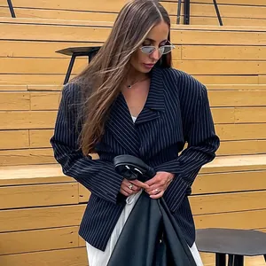 Chic navy blue vertical stripe blazer with waist-slimming fit for professional commuting