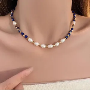 Lapis lazuli and freshwater pearl necklace with gold spacer beads for elegant look