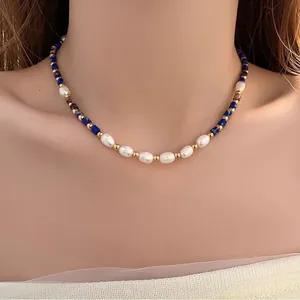 Elegant freshwater pearl and lapis lazuli beaded necklace worn on neck for fashion