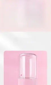 Detailed view of the 550ml pink pet water dispenser bottle and plastic base component