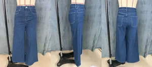 Three-way view of deep blue high-waisted wide leg jeans with white stitching detail