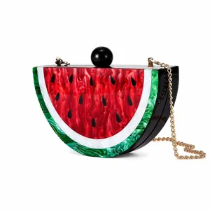 Watermelon acrylic evening clutch with marble texture and gold chain shoulder strap