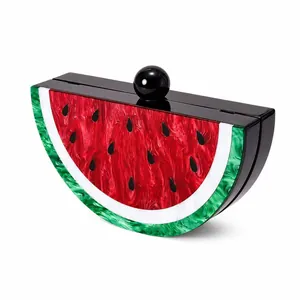 Unique watermelon acrylic clutch bag with marble texture and gold chain strap for parties