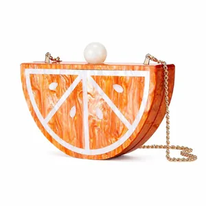 Orange slice acrylic evening clutch bag with marble texture and gold chain strap