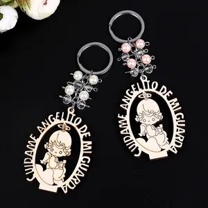 Close-up of wooden angel keychain with Cuidame Angelito text and colorful crystal beads