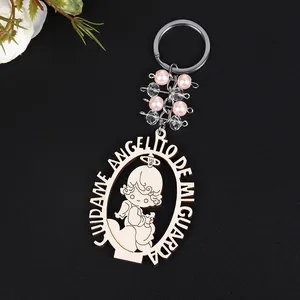 Wooden angel keychain with pink beads and Spanish guardian angel laser engraving