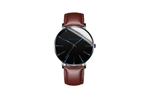 Close-up of black watch dial with striking blue hands and brown leather strap