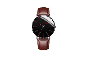 Detail view of MONYORN watch featuring black dial, red markers, and brown leather strap