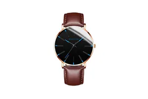 Detailed close-up of MONYORN men's watch with rose gold case and blue markers