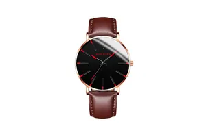 Detail of the MONYORN watch with brown leather strap and rose gold metal case