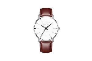 Detail of brown leather watch strap and minimalist white dial with silver case