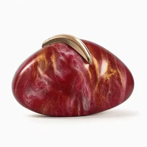 Artistic marble textured acrylic evening clutch bag with elegant golden crescent clasp