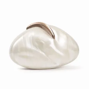 Irregular pebble-shaped pearlescent acrylic evening clutch bag with rose gold clasp