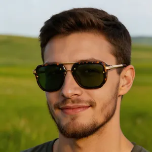 Male model wearing retro square tortoiseshell sunglasses with gold metal bridge outdoors