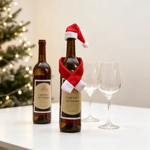 Festive red and white Christmas mini hat and scarf set for wine bottle table decoration
