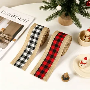 Close-up of rustic burlap Christmas ribbons with classic black-white and red-black checkered patterns