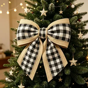 Close-up of a buffalo plaid Christmas bow with burlap edges on a festive tree