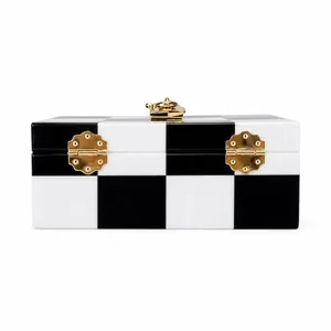 Retro checkered box clutch with golden metal clasp and black and white acrylic finish