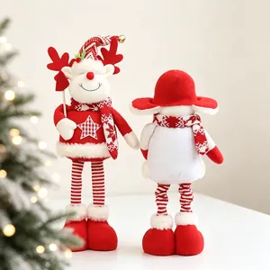 Pair of Christmas reindeer plush dolls with striped hats and snowflake scarves in front/back view
