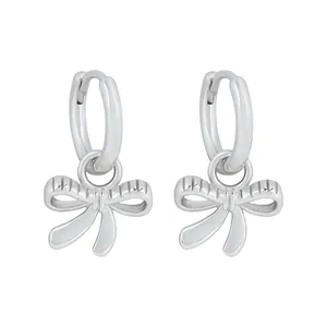 Elegant s925 silver bow drop huggie earrings featuring minimalist textured metallic design