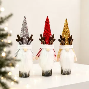 Three sequined Christmas gnome wine bottle covers with reindeer antlers and white fur beards