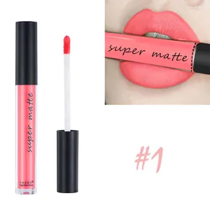 Detailed view of matte velvet liquid lipstick #1 in coral pink on a model's lips