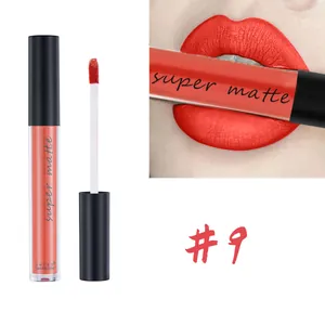 Detailed view of matte liquid lipstick #9 bright orange-red shade with applicator brush