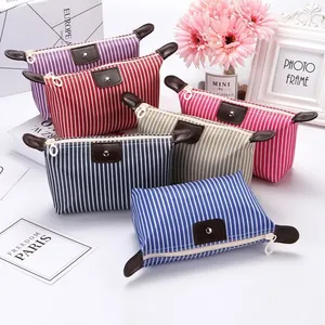 Striped dumpling makeup bags in purple, red, pink, khaki, navy and bright blue colors