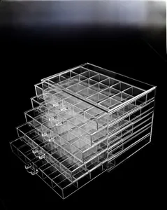 Detailed view of 5-layer acrylic jewelry organizer with transparent grid drawer design