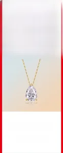 Macro detail of pear-shaped moissanite pendant on a 925 silver gold-plated chain