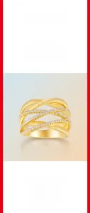 Detail of brushed gold s925 silver ring featuring layered crossover bands with moissanite
