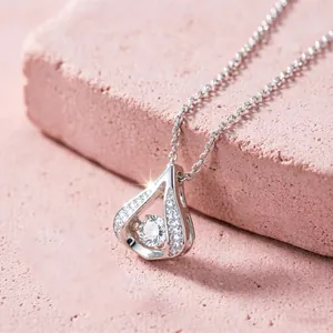 Polished stainless steel water drop pendant necklace with shimmering zircon center stone