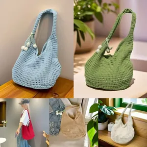 Detailed view of handmade crochet knit shoulder bags in multiple colors with floral charm