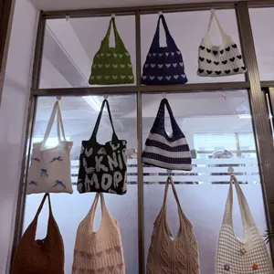 Handmade crochet tote bags with heart and floral patterns for vintage holiday travel style