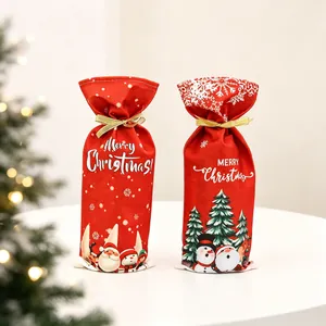 Christmas wine bottle gift bags with gold ribbons and festive cartoon illustrations