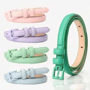 Detailed macro view of slim PU leather belts in pastel macaron colors with pin buckle