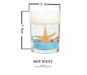 Detail of ocean-themed jelly candle with shells and starfish in 5.5x7.5cm glass jar