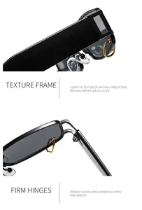 Detail of high-gloss black square frame sunglasses with gold rings and sturdy metal hinges