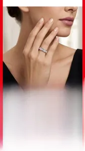 Detail of S925 sterling silver ring featuring sparkling moissanite stones on finger