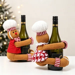 Christmas gingerbread man wine bottle covers with chef hats for holiday table decor