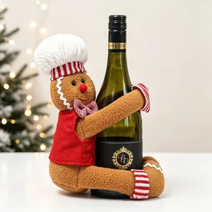 Close-up of cute gingerbread man plush doll hugging a wine bottle for Christmas decor