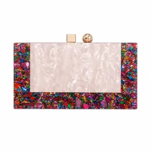 Retro acrylic evening clutch with mother of pearl texture and colorful foil accents